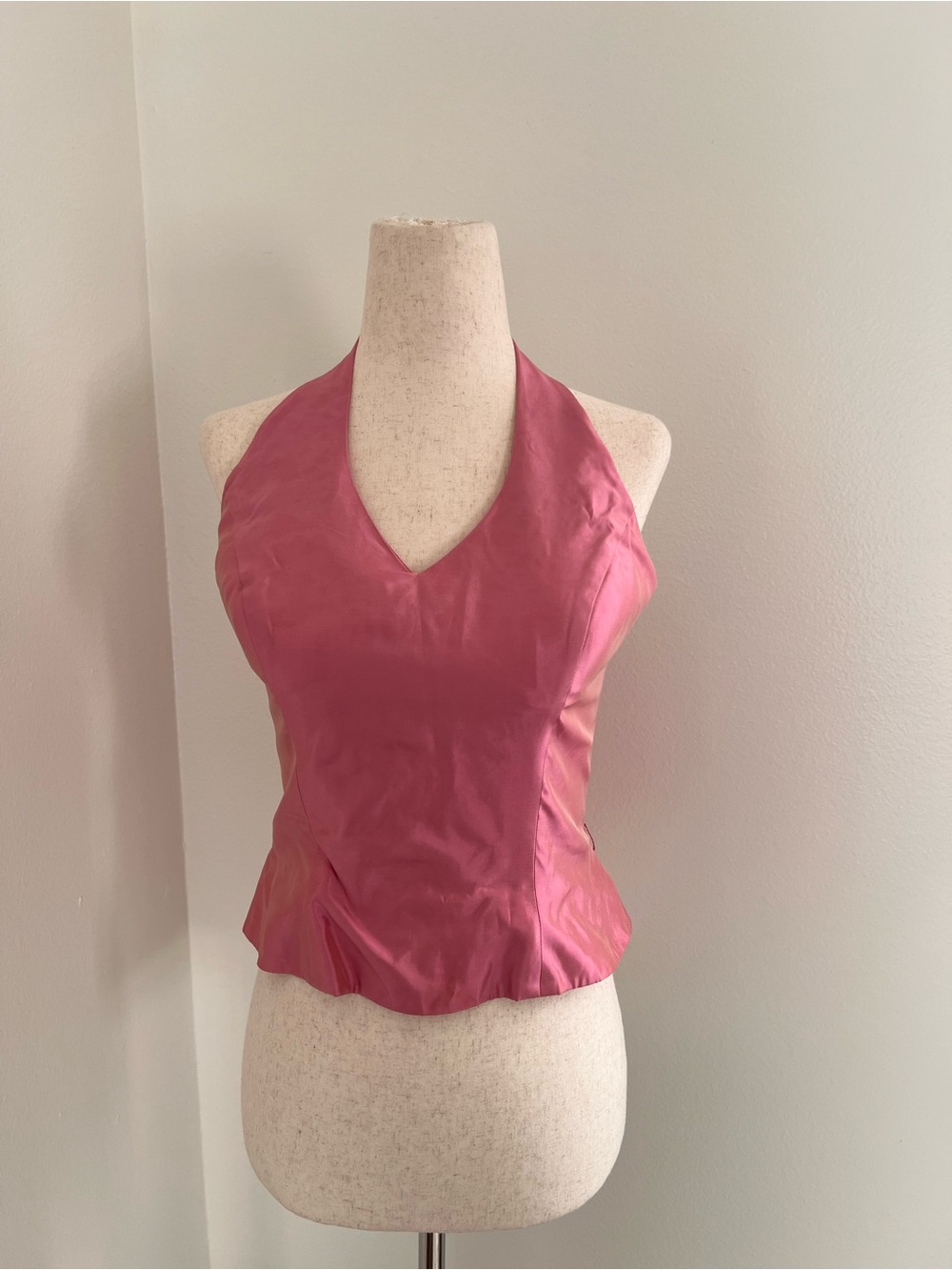 Bill Levkoff pink halter top in pink iridescent finish. Top has boning. Size: XS